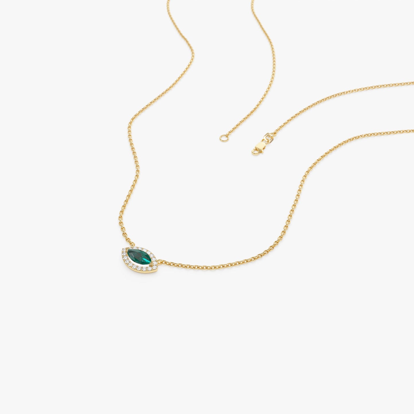 14k Marquise Emerald with Halo Diamond Setting