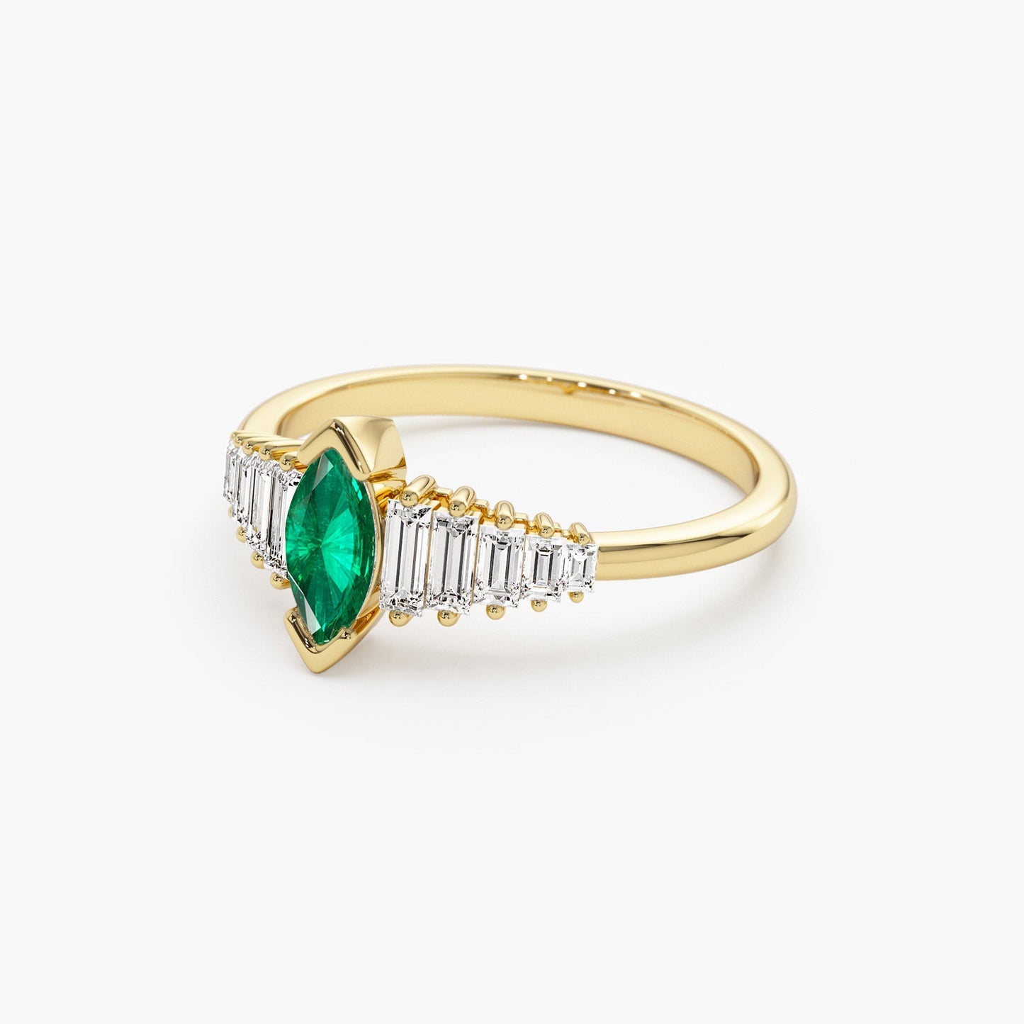 14k Gold Marquise Shape Emerald Ring with Baguette Accents - Geum Jewels
