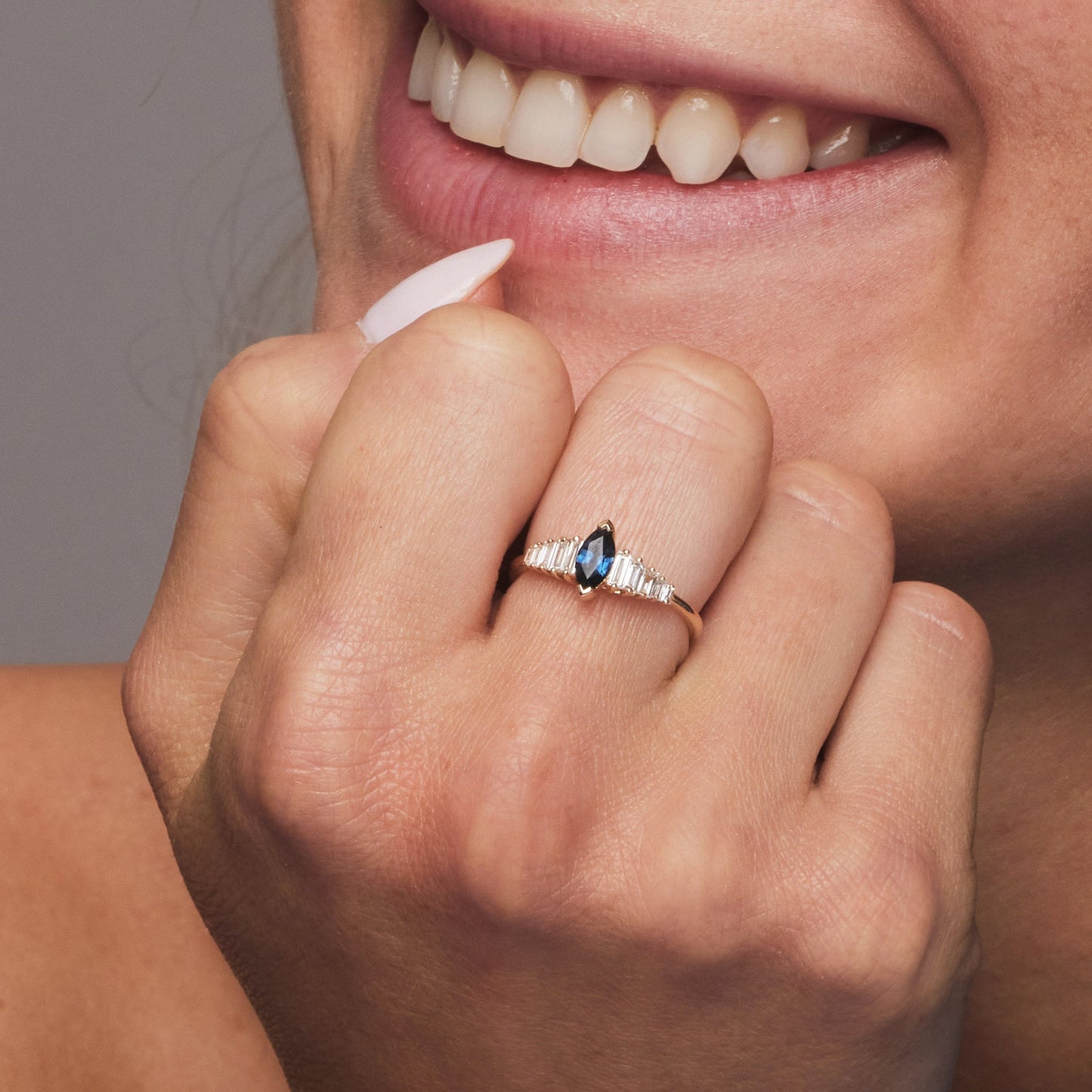 14k Gold Marquise Shape Sapphire Ring with Baguette Accents
