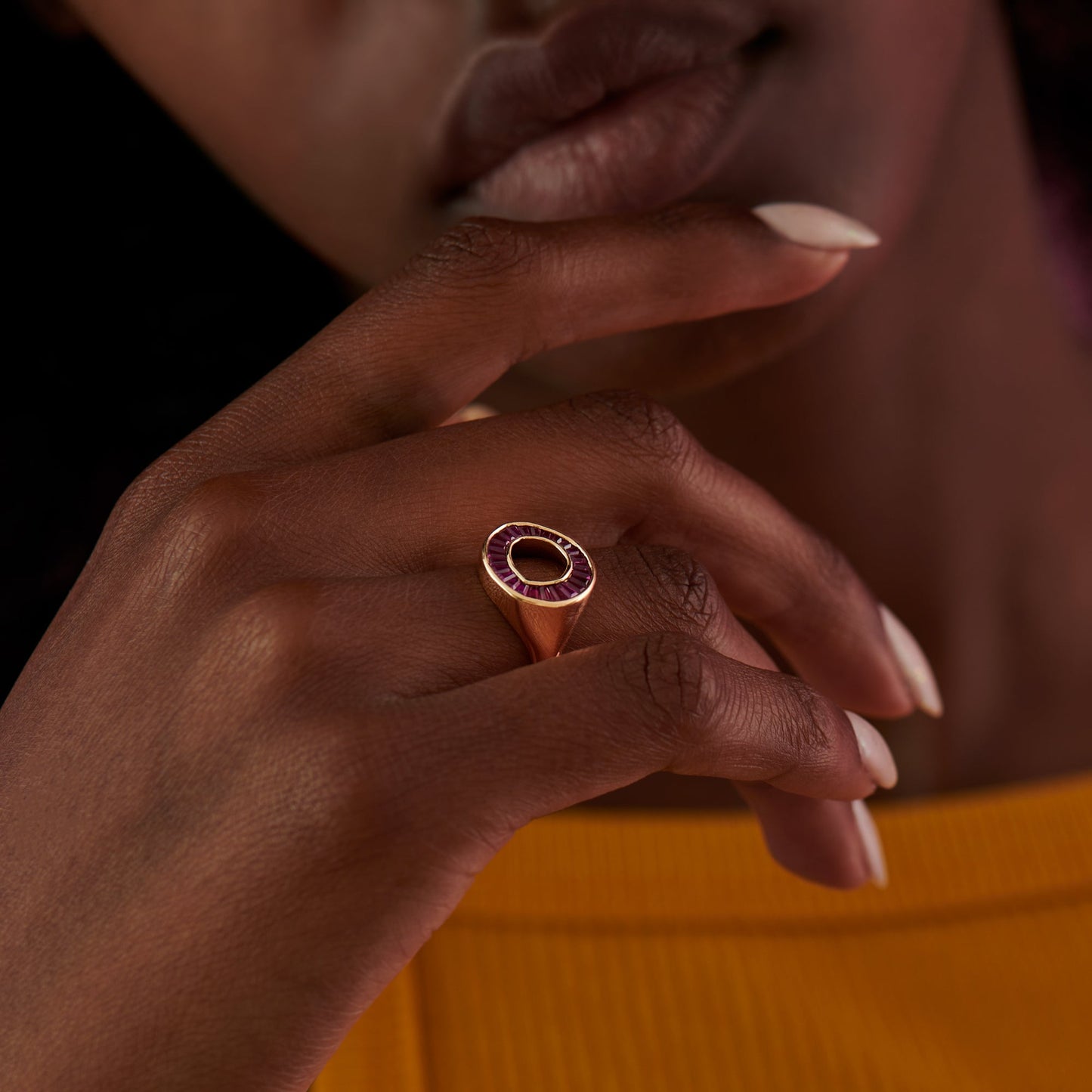 Ruby-Tapered-Baguette-Gold-Statement-Ring-on-finger