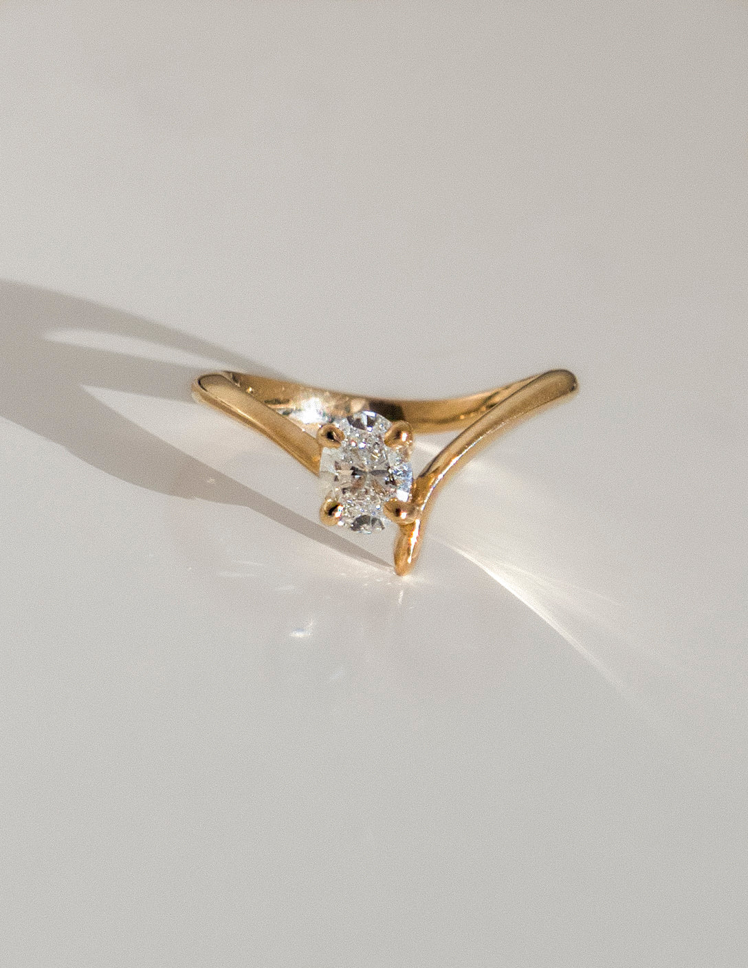 Cadette Oval Eve engagement ring with claw setting. Oval nature inspired engagement ring. Oval plant inspired engagement ring.