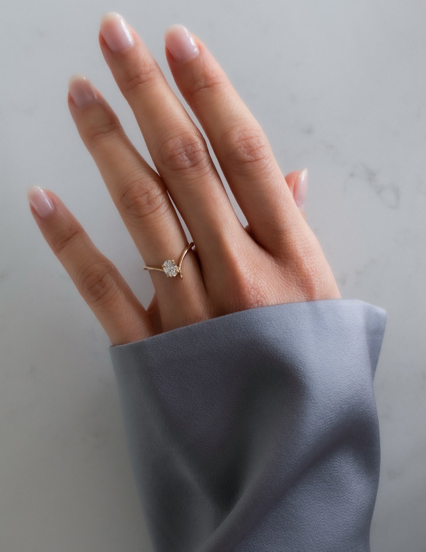 Cadette Oval Eve engagement ring with claw setting. Oval nature inspired engagement ring. Oval plant inspired engagement ring.