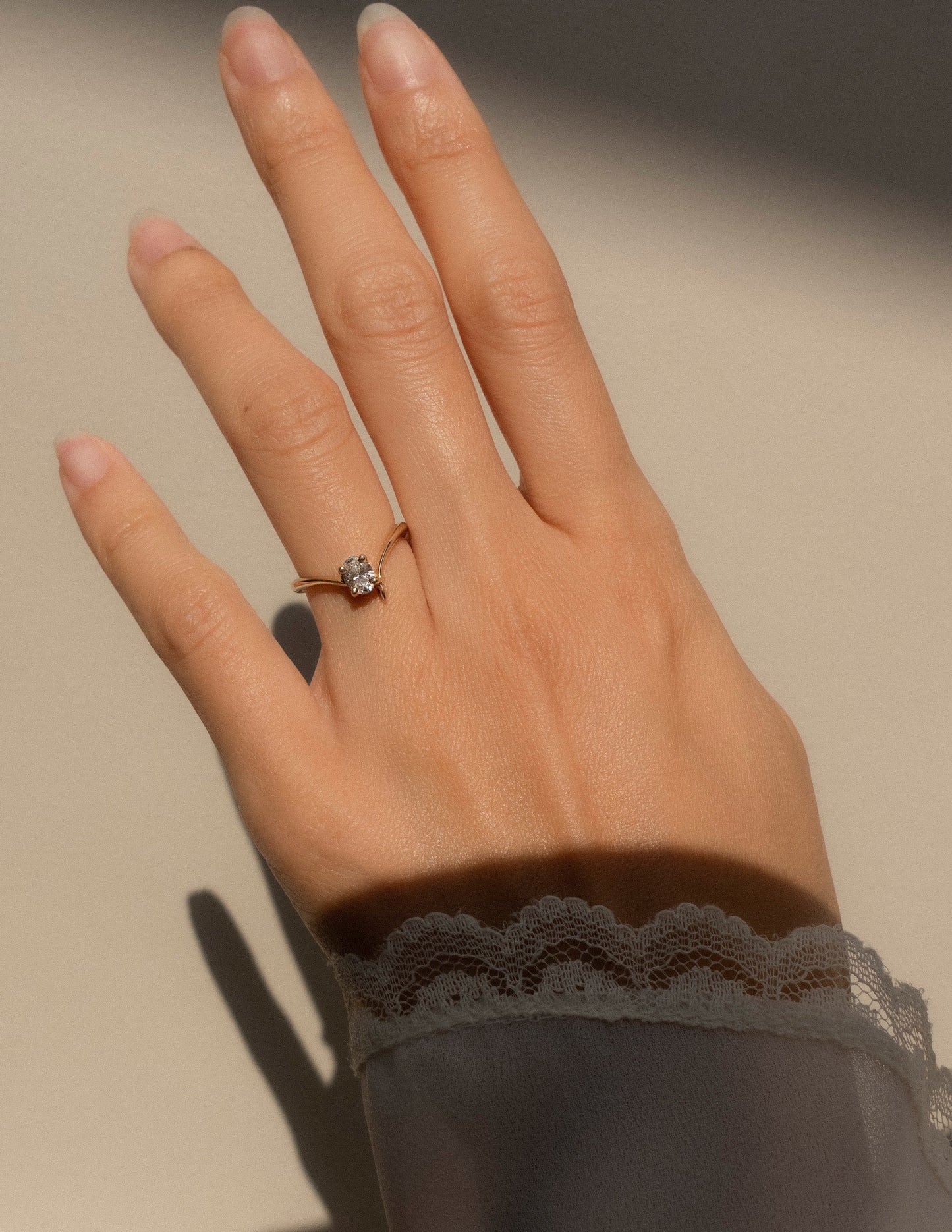 Cadette Oval Eve engagement ring with claw setting. Oval nature inspired engagement ring. Oval plant inspired engagement ring.