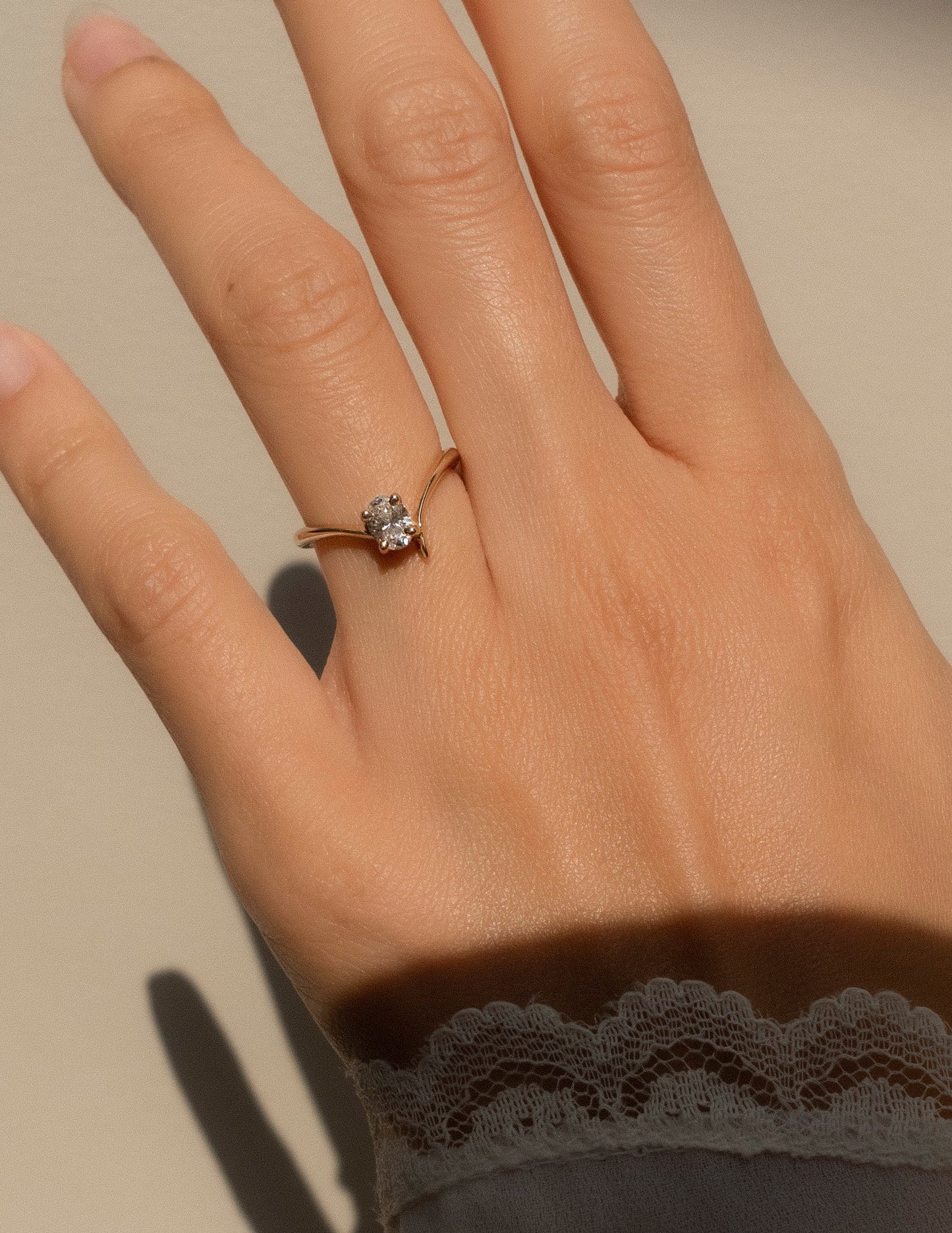 Cadette Oval Eve engagement ring with claw setting. Oval nature inspired engagement ring. Oval plant inspired engagement ring.