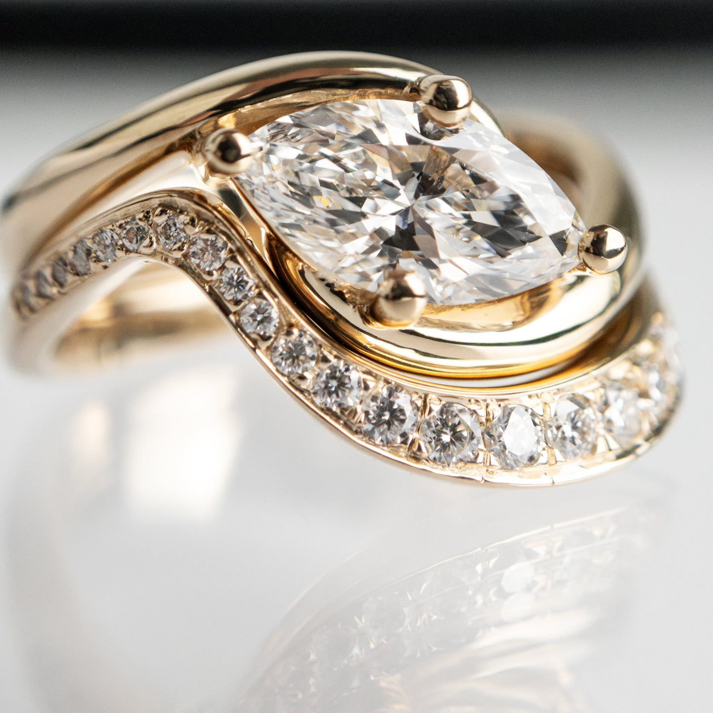 Cadette Marquise Rapture engagement ring set with band. Marquise Ocean Inspired Engagement solitaire Ring with band. Marquise Nature Inspired Engagement solitaire Ring with band.