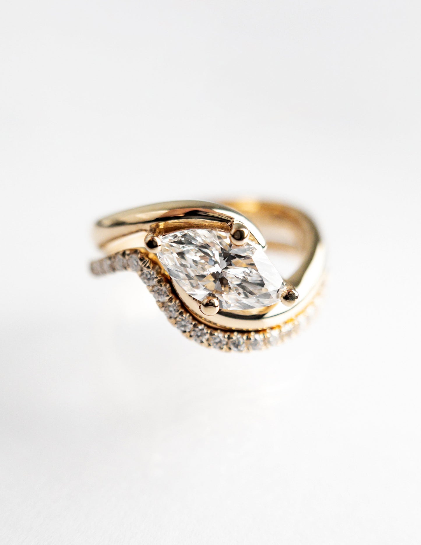 Cadette Marquise Rapture engagement ring set with band. Marquise Ocean Inspired Engagement solitaire Ring with band. Marquise Nature Inspired Engagement solitaire Ring with band.