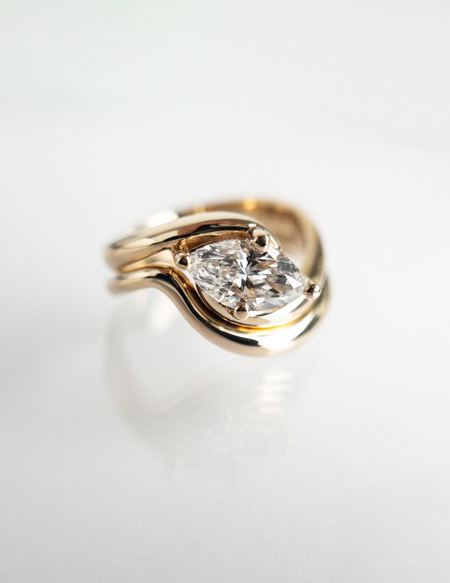 Cadette Marquise Rapture engagement ring set with band. Marquise Ocean Inspired Engagement solitaire Ring with band. Marquise Nature Inspired Engagement solitaire Ring with band.