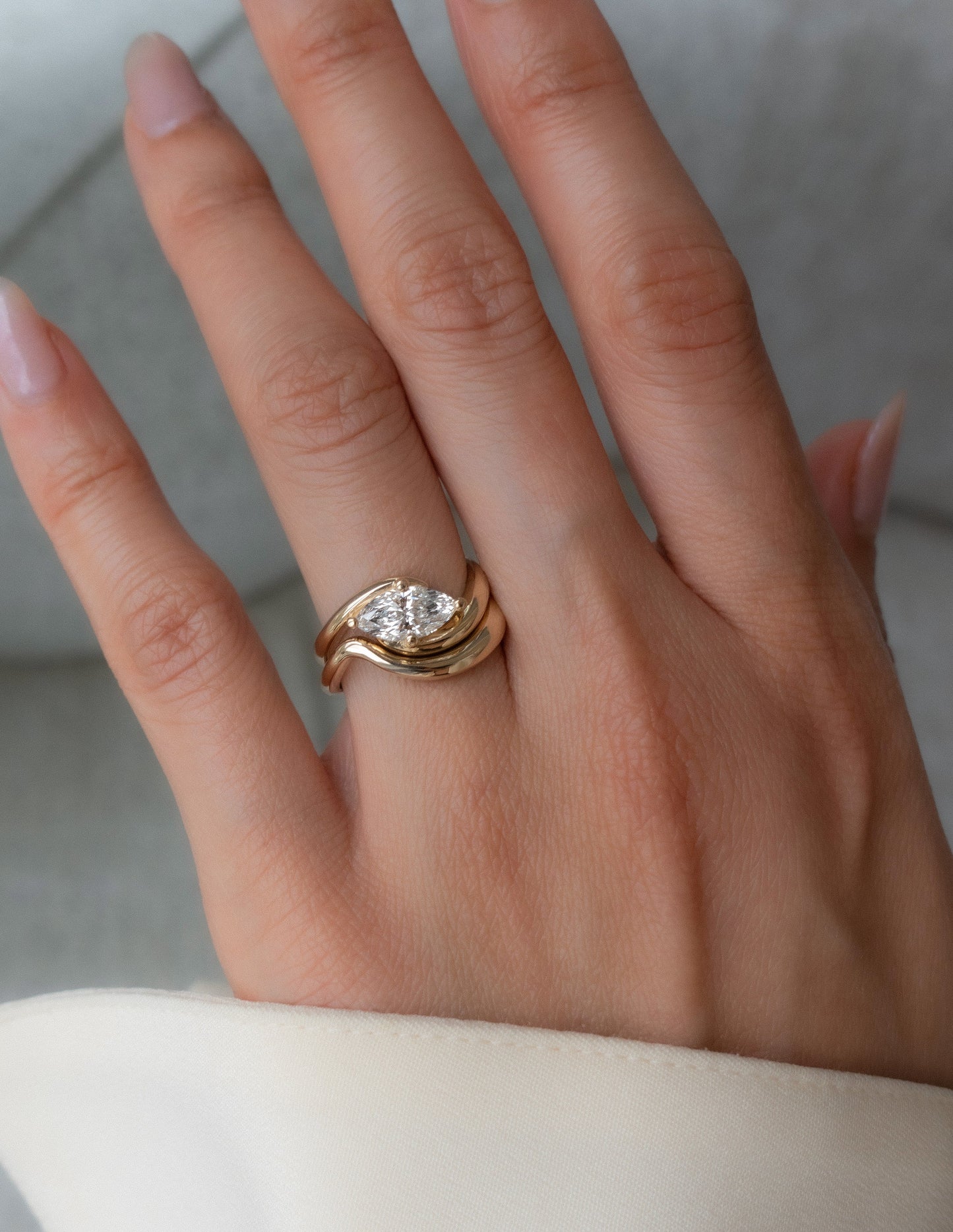 Cadette Marquise Rapture engagement ring set with band. Marquise Ocean Inspired Engagement solitaire Ring with band. Marquise Nature Inspired Engagement solitaire Ring with band.