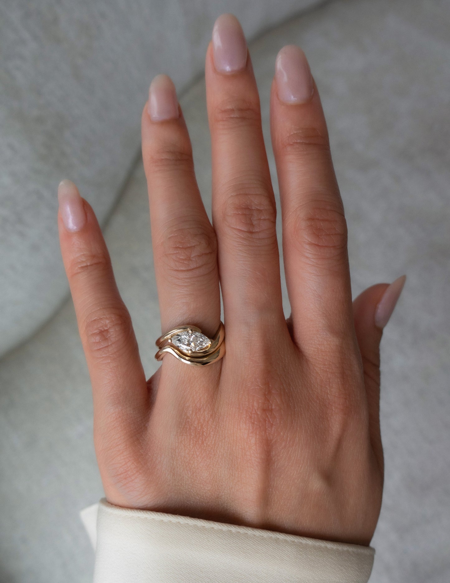 Cadette Marquise Rapture engagement ring set with band. Marquise Ocean Inspired Engagement solitaire Ring with band. Marquise Nature Inspired Engagement solitaire Ring with band.