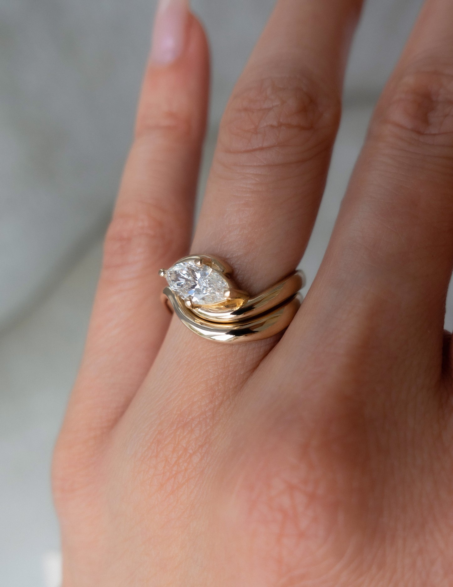 Cadette Marquise Rapture engagement ring set with band. Marquise Ocean Inspired Engagement solitaire Ring with band. Marquise Nature Inspired Engagement solitaire Ring with band.