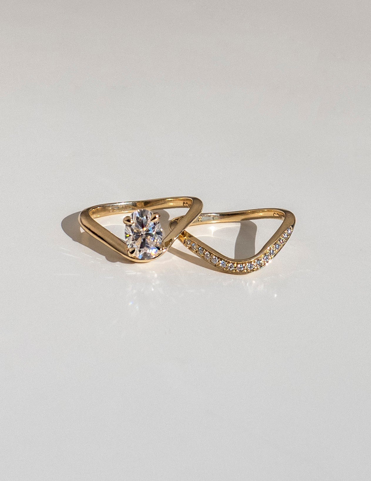 Cadette Oval Sunrise engagement ring with band. Oval nature inspired engagement ring with band. Oval sunrise inspired engagement ring with band.