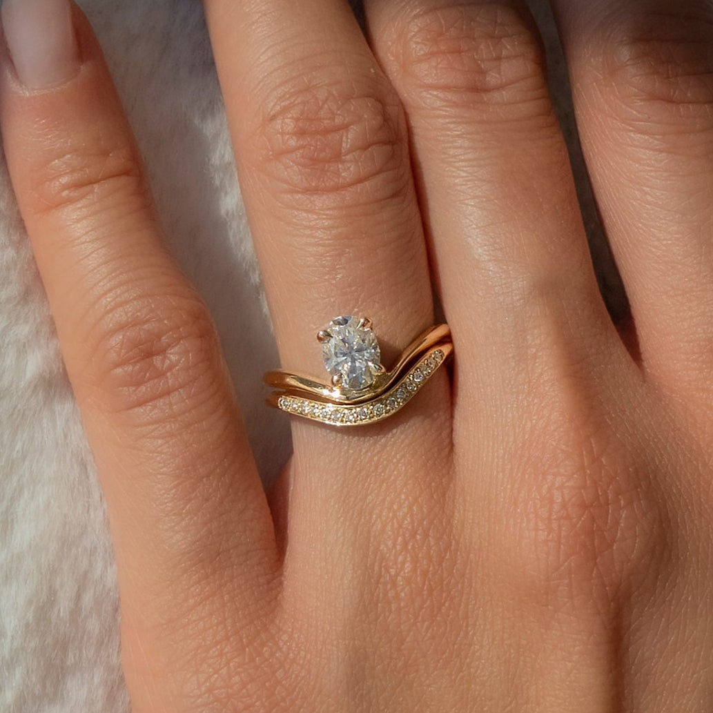 Cadette Oval Sunrise engagement ring with band. Oval nature inspired engagement ring with band. Oval sunrise inspired engagement ring with band.
