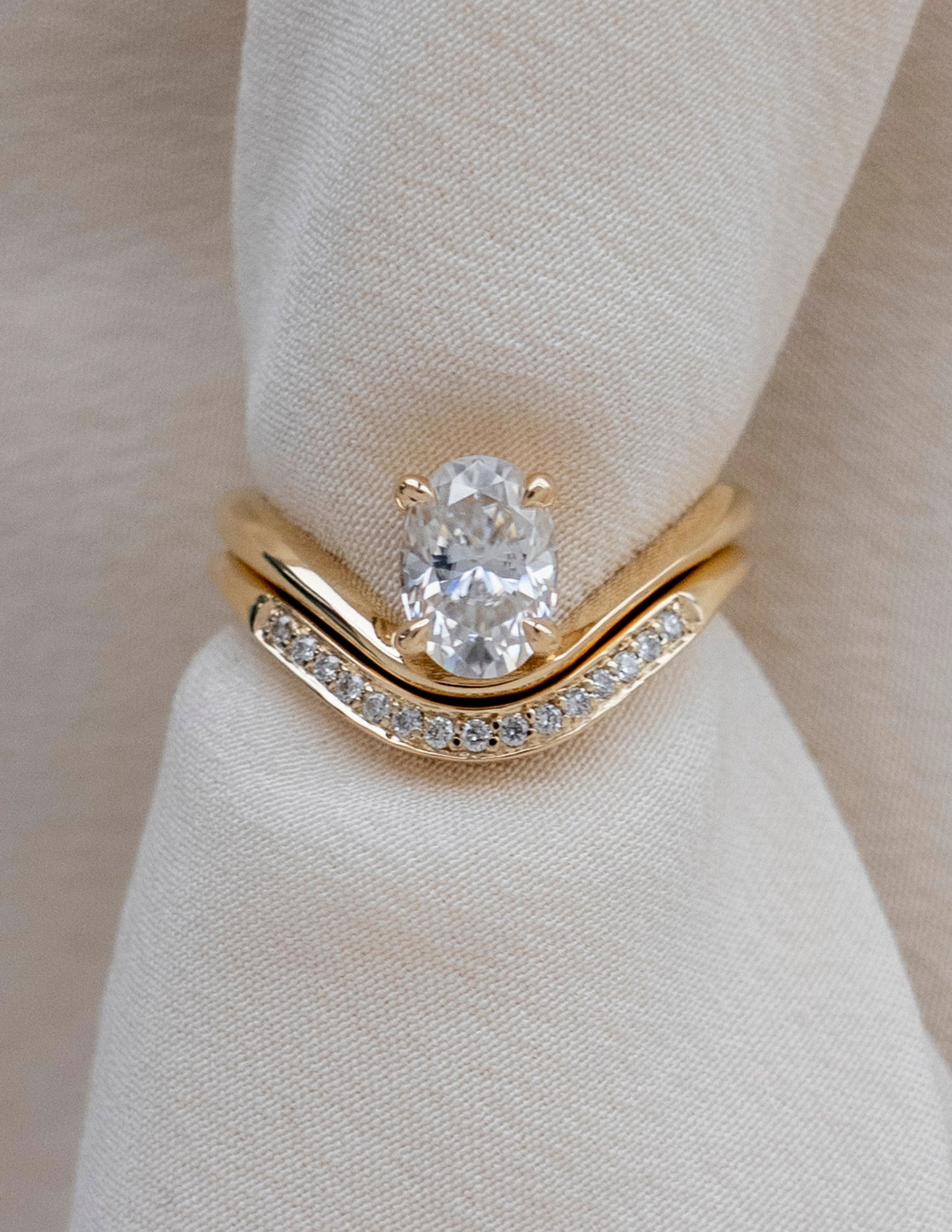Cadette Oval Sunrise engagement ring with band. Oval nature inspired engagement ring with band. Oval sunrise inspired engagement ring with band.