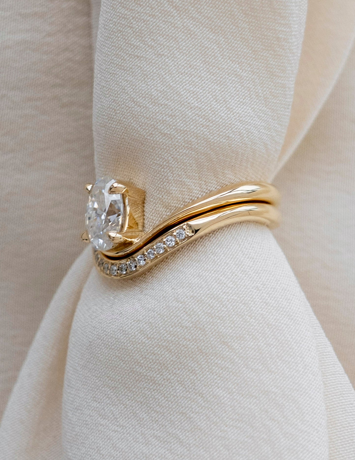 Cadette Oval Sunrise engagement ring with band. Oval nature inspired engagement ring with band. Oval sunrise inspired engagement ring with band.