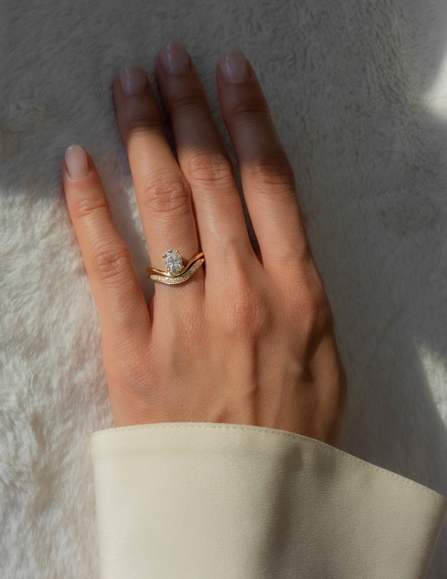 Cadette Oval Sunrise engagement ring with band. Oval nature inspired engagement ring with band. Oval sunrise inspired engagement ring with band.