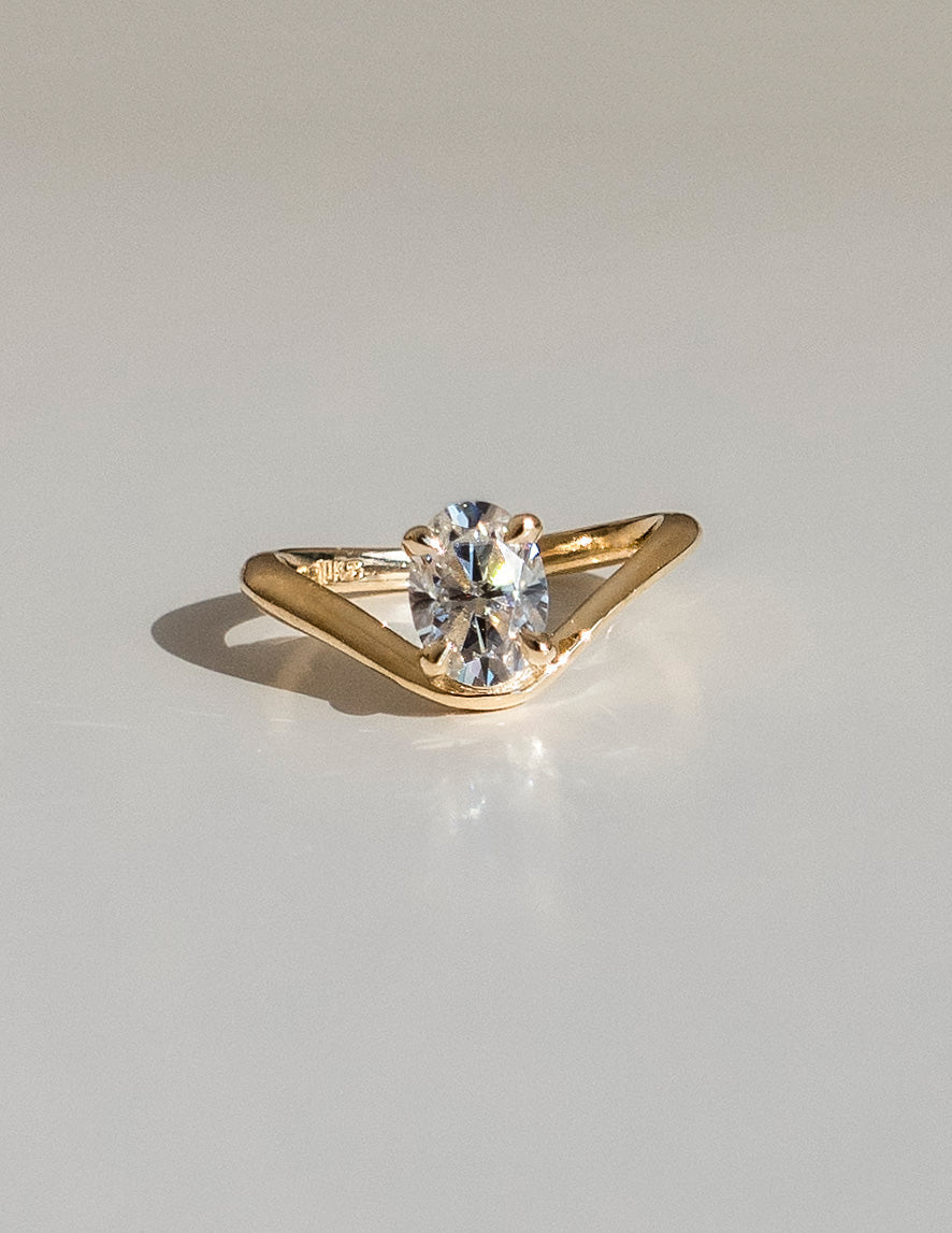 Cadette Oval Sunrise engagement ring with band. Oval nature inspired engagement ring with band. Oval sunrise inspired engagement ring with band.