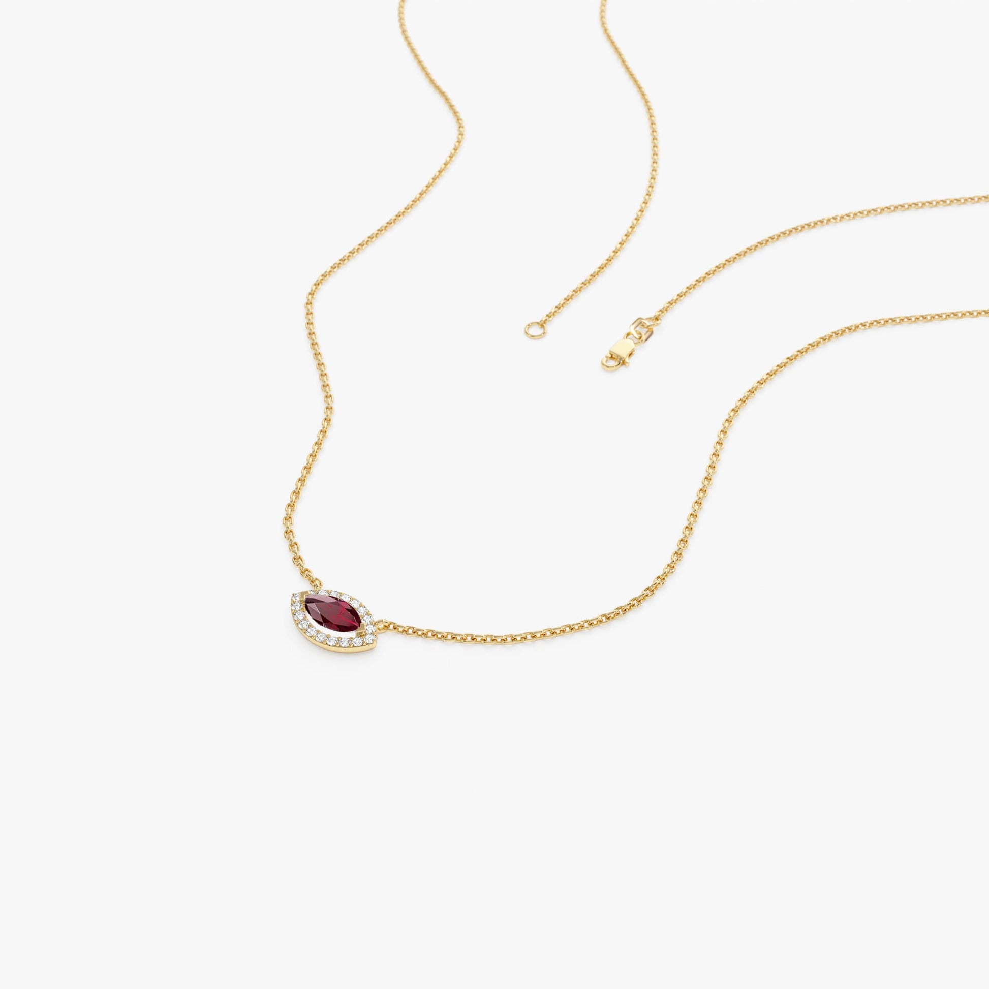 14k Marquise Ruby with Halo Diamond Setting