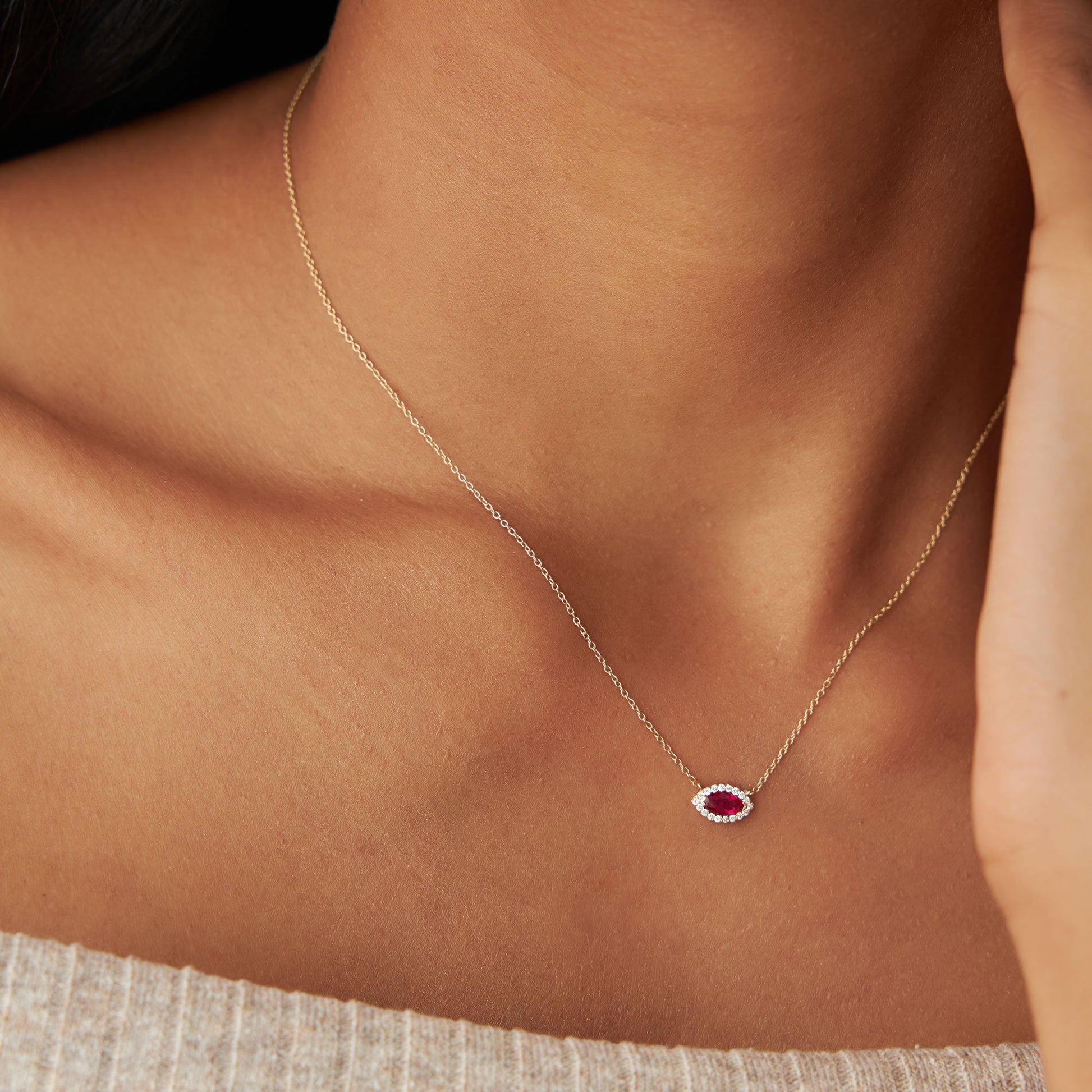 14k Marquise Ruby with Halo Diamond Setting