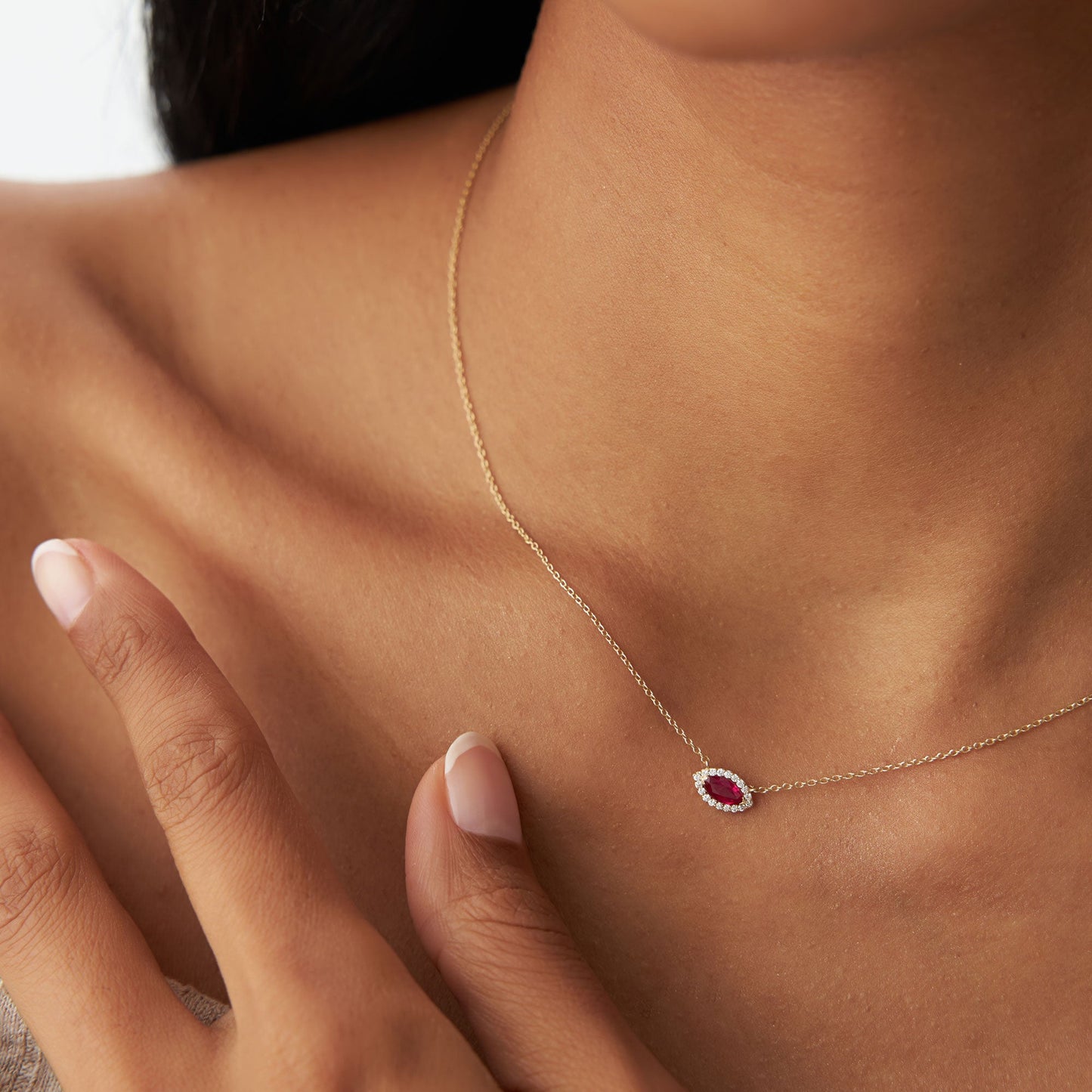 14k Marquise Ruby with Halo Diamond Setting