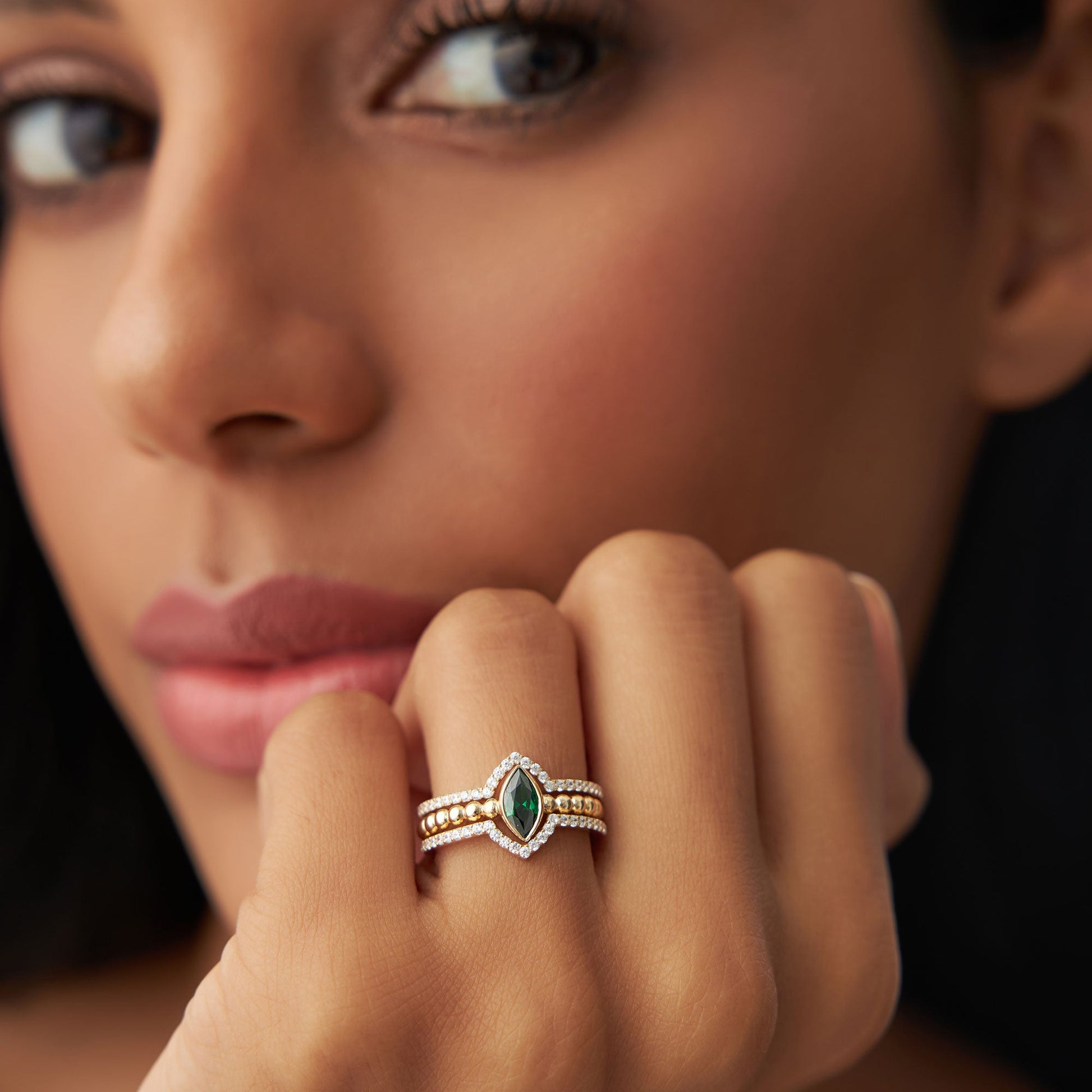 14k Marquise Shaped Emerald Ring with Nesting Diamond Bands